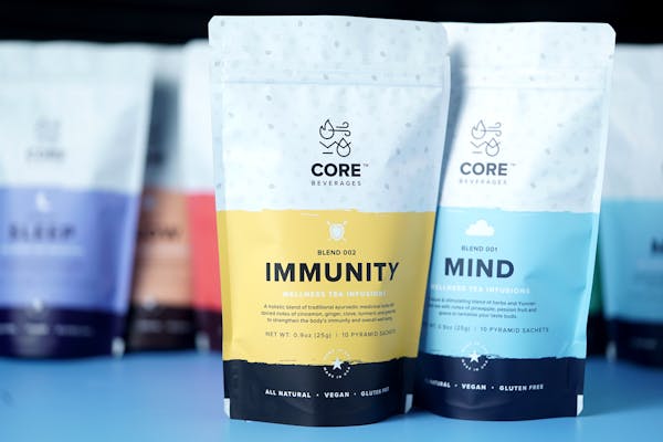 Vibrant packaging of wellness tea blends highlighted with focus on immunity and mind infusions.